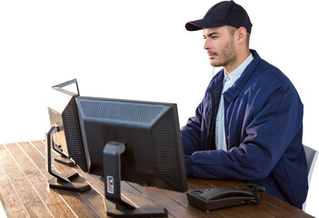 Serious security officer using computer