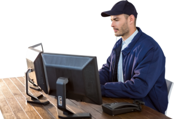 Serious security officer using computer