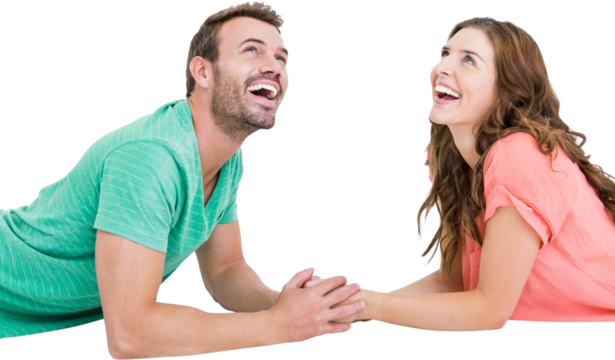 Happy young couple looking up