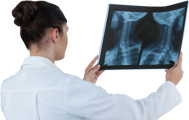 Female doctor checking x-ray report