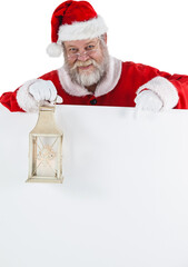 Naklejka premium Santa Claus holding Christmas lantern