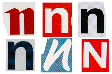 Letter font n from printout magazine cut out, collage element.