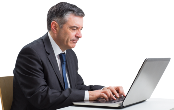 Mature businessman using his laptop