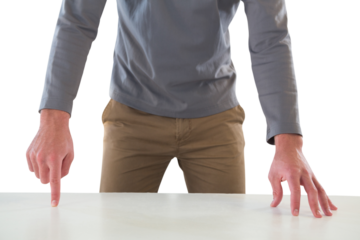 Midsection of businessman gesturing while giving presentation against white background