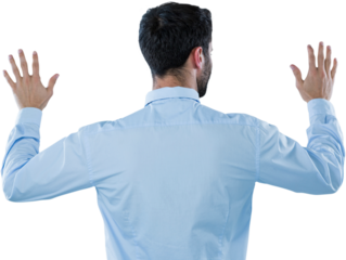 Rear view of businessman pretending to use invisible screen