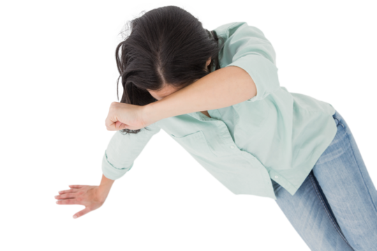 Sad woman sitting on the floor and hiding her face