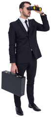 Businessman holding a briefcase while using binoculars 