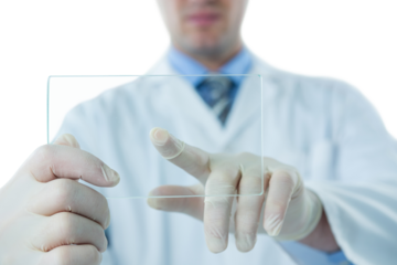 Male doctor using futuristic glass