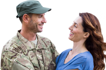 Close-up of man in army uniform holding wife