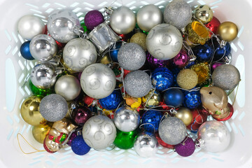 Christmas baubles in palstic basket