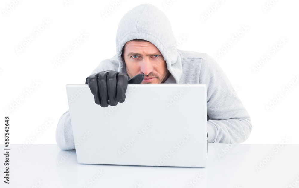 Poster hacker using laptop to steal identity