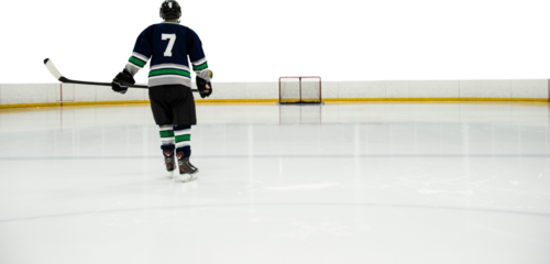 Rear view of player holding ice hockey stick