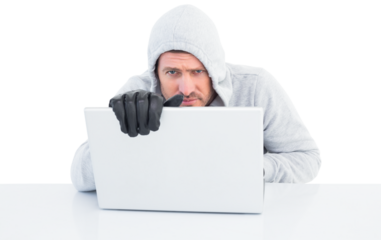 Hacker using laptop to steal identity