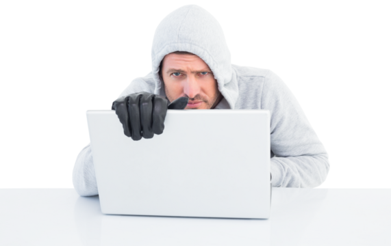 Hacker using laptop to steal identity