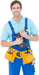 Confident carpenter holding drill machine
