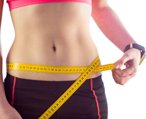 Woman measuring waist over white background