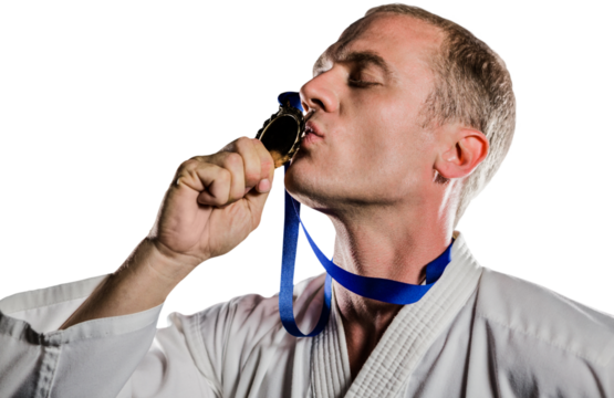 Fighter kissing his gold medal - Powered by Adobe