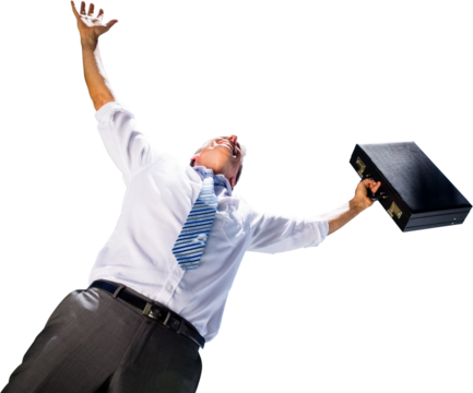 Low angle view of businessman with arms raised while holding briefcase 
