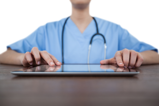 Mid-section of female doctor using digital tablet