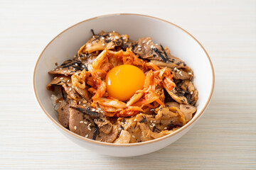 pork bulgogi rice bowl with kimchi and Korean pickled egg