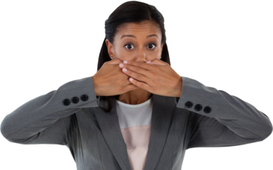 Businesswoman covering her mouth