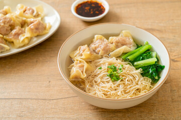 egg noodles with pork wonton soup or pork dumplings soup and vegetable