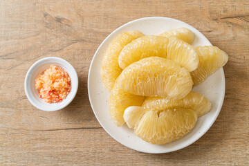 Fresh peeled pomelo, grapefruit or shaddock