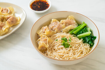egg noodles with pork wonton soup or pork dumplings soup and vegetable