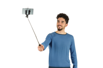 Casual man using a selfie stick