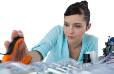 Female computer engineer working on computer motherboard