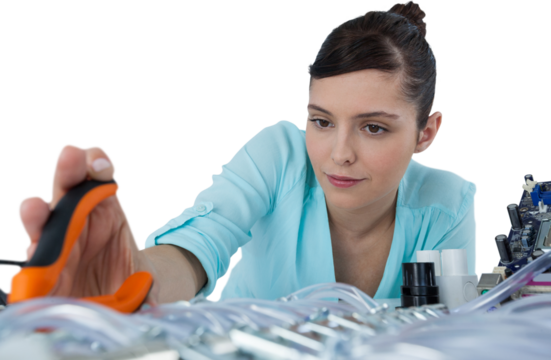 Female computer engineer working on computer motherboard
