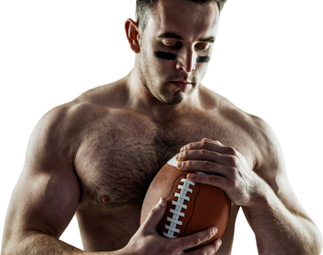 Shirtless American football player with ball