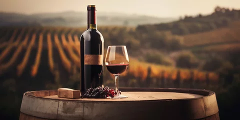 Fotobehang Tuscan vineyard tasting: Wine bottle and glass with scenic backdrop © Studiorlando