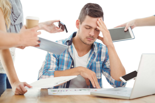 Depressed businessman with head in hand