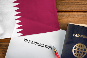 Visa application form, passport and flag of Qatar
