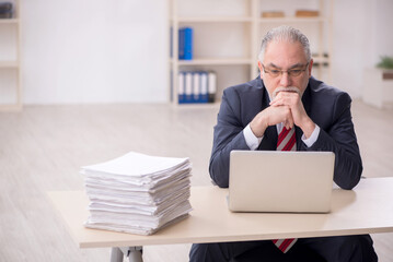 Old male employee and too much work at workplace