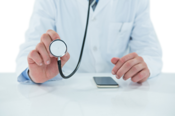 Midsection of doctor holding stethoscope