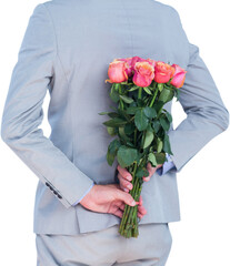Businesswoman holding bouquet behind her back