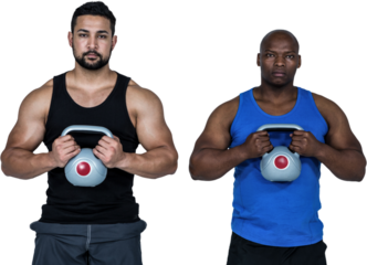 Strong friends lifting kettlebells together