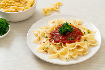 farfalle pasta in tomato sauce with parsley