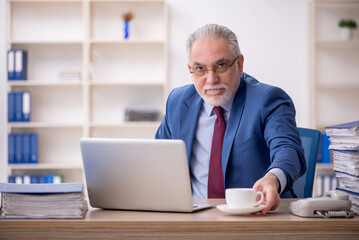 Old male employee and too much work at workplace