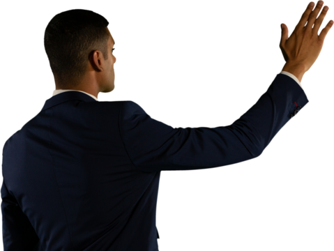 Rear view of man touching invisible screen