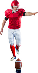 American football player kicking football