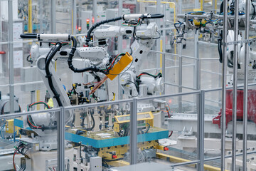 robot arm wotking in factory