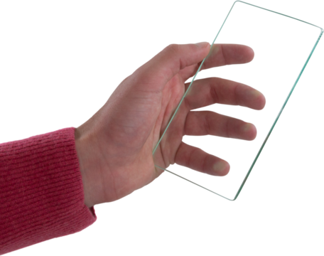 Close-up of man holding glass mobile phone