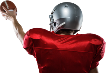 Rear view of American football player in red jersey holding ball