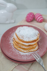 sweet home made carrot easter pancakes on a table