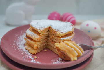 sweet home made carrot easter pancakes on a table