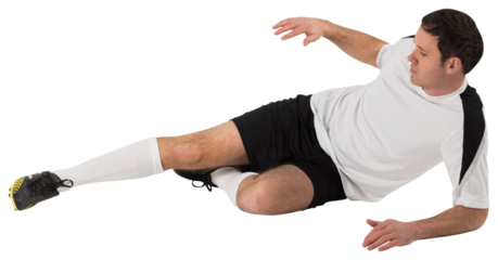 Football player in white kicking