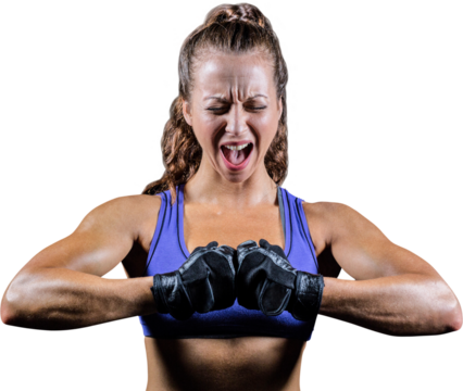 Aggressive female boxer flexing muscles - Powered by Adobe